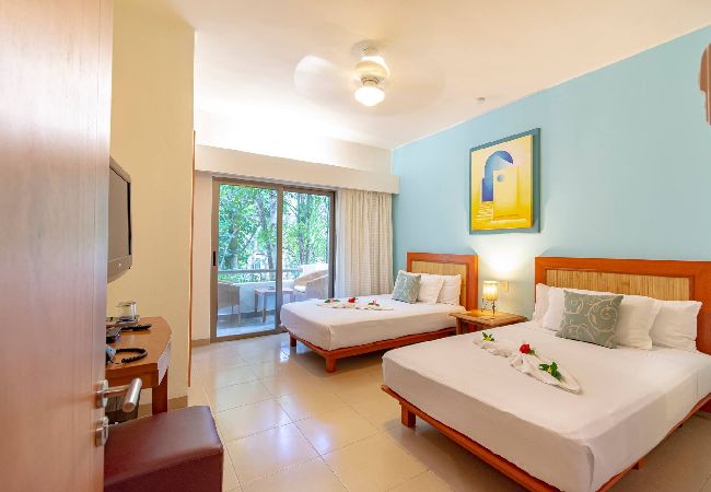 Renta por habitaciones en Playa del Carmen - R106. Standard Room 2 Camas.