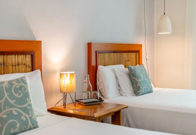 Renta por habitaciones en Playa del Carmen - R106. Standard Room 2 Camas.