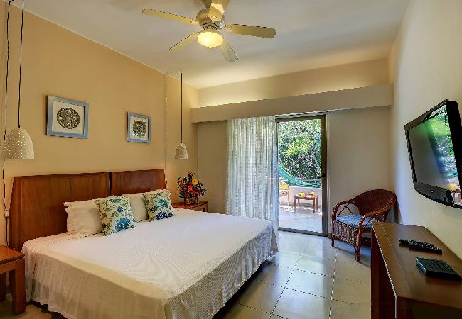 Condohotel in Playa del Carmen - R102. Riviera Maya Suites 2Rec Vista Jardin.